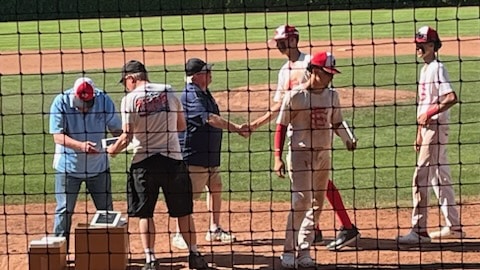 Tournament Director Steve Meyer along with volunteers Drew Aspegren and Rick Stice congratulate players. Napa Valley Baseball Club photo